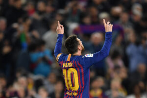 Lionel Messi celebrating a goal during a match.